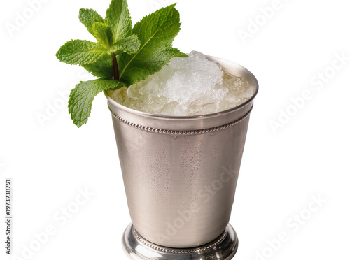 Isolated classic mint julep cocktail in a silver metal cup with crushed ice and fresh mint