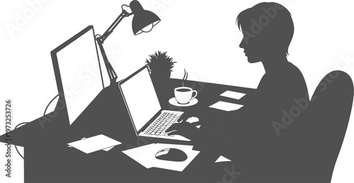 Home office silhouette of a person working with dual monitors