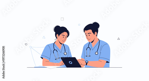 Two doctors in blue scrubs looking at a laptop, discussing medical information.