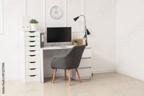 Workplace with computer, la...