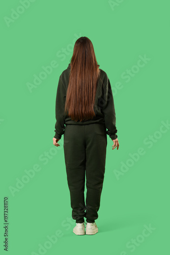 Young woman in khaki sports...