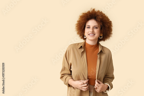Redhead young woman with cu...