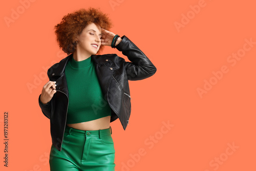 Redhead young woman with cu...