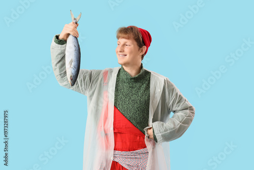 Funny young fisherman with ...