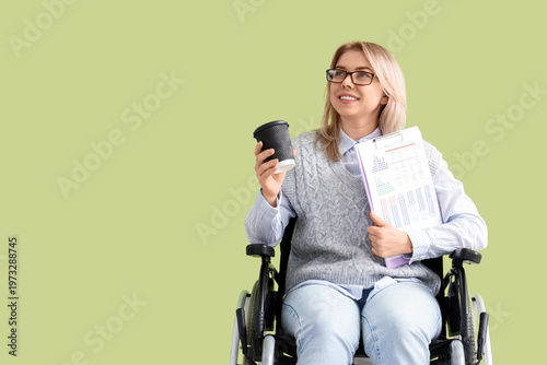 Young businesswoman with co...