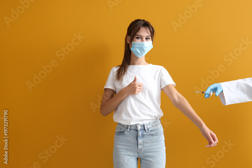 Young woman in medical mask...