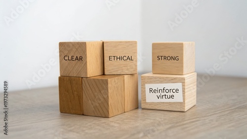 Wooden blocks with clear ethical strong words on a modern desk emphasizing the concept of reinforcing virtue and values