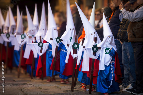 Foto Children in traditional robes participating in a Holy Week procession
