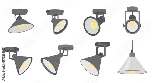 A comprehensive collection of eight industrial grey ceiling spotlights is displayed in various orientations and angles against a stark and neutral white background.