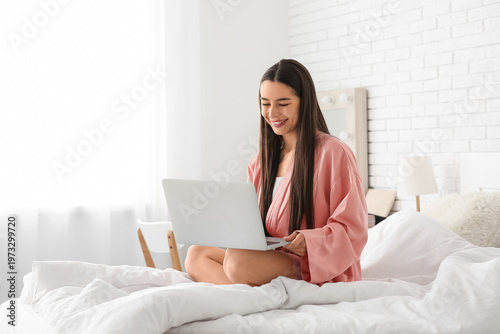 Morning of happy young woma...