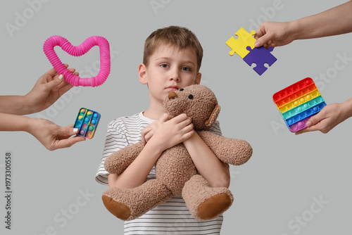 Sad little boy and female h...