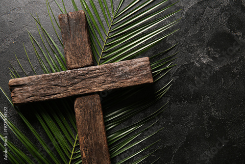 Wooden cross with palm leaf...