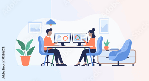 Two people collaborating at computers in a modern office with plants and artwork