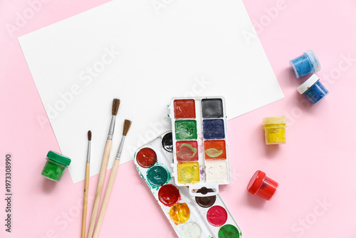 Watercolor paints, brushes ...