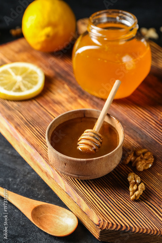 Bowl of sweet honey with di...
