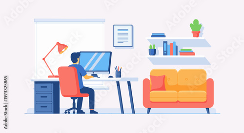 A person works at a computer in a modern home office with a sofa