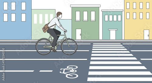 Cyclist crossing a street on a bike lane in a city with buildings and crosswalk