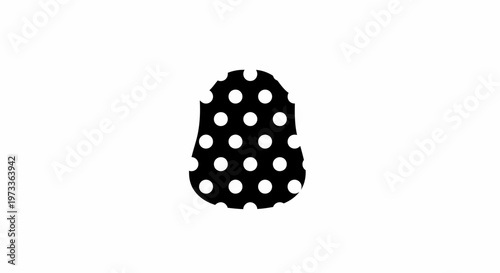 Black and white polka dot nail.