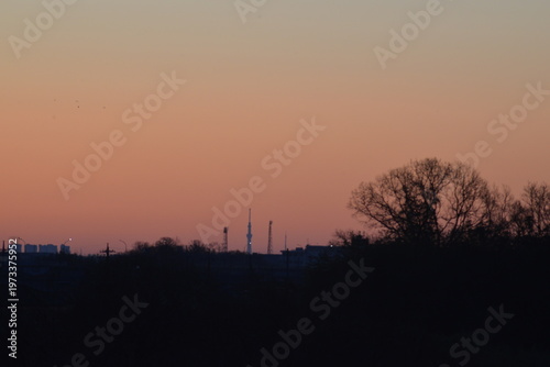 The beautiful pre-dawn sky and the distant tower