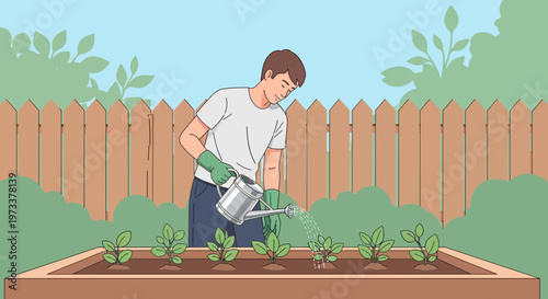 Gardener watering young plants in a raised garden bed with a watering can