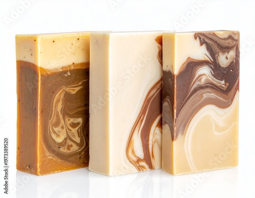 Three rectangular soaps, showcasing swirled colors and textures, stand isolated against a pristine white background. They are neatly arranged