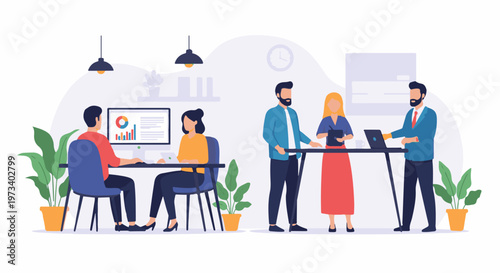 Modern office scene with four professionals collaborating around desks and computers