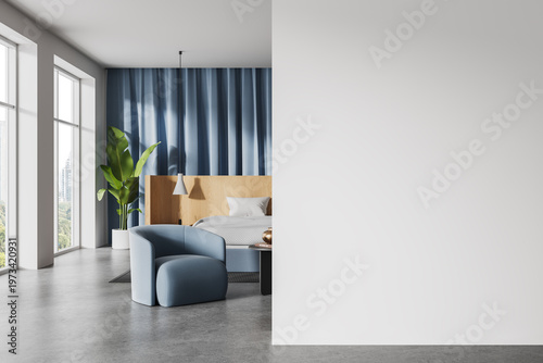 Modern interior bedroom with blue chair, large windows, plant decor and wide empty wall mockup for clean design presentation. "" 3D Rendering