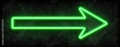 Bright green glowing neon arrow pointing to the right on  textured dark surface