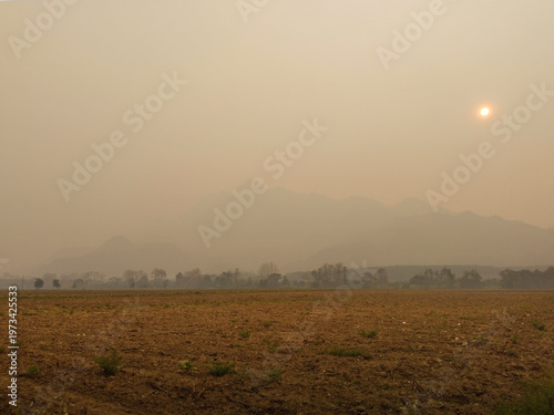 The famous Doi Nang Non mountain range in northern Thailand is almost completely obscured by air polluted with PM2.5 smoke from extensive crop burning in neighboring countries.