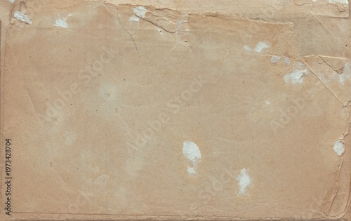 Vintage background of old ancient torn paper texture