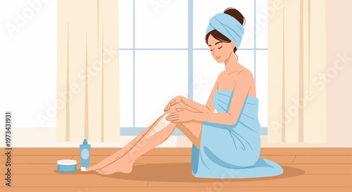 Woman applies lotion to her leg after a bath, wrapped in a towel