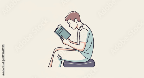 Person sitting and reading a book