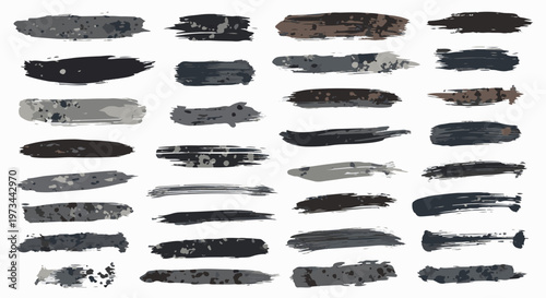 A collection of abstract, hand-drawn brush strokes in various shades of grey and black