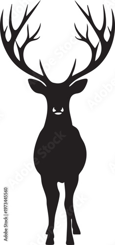 Majestic silhouette of a deer with impressive branching antlers standing upright.