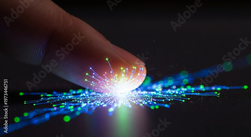 Glowing network of fiber optic cables emanating from a fingertip, symbolizing digital connection and technological advancement