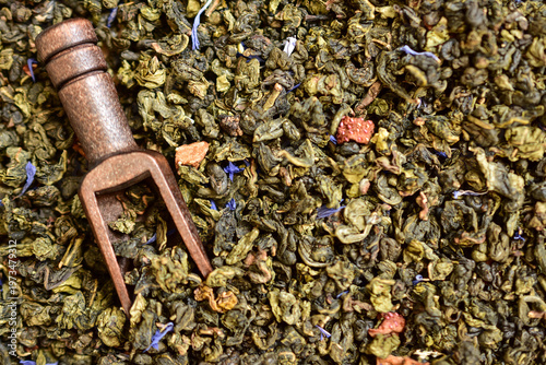 Green tea leaves for brewing. Tea background. Flat lay.
