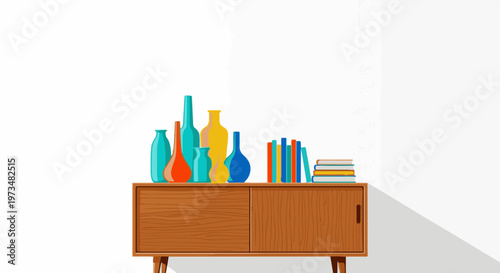 A wooden cabinet displays colorful vases and stacked books, casting a shadow