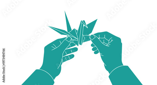 Hands making origami crane.