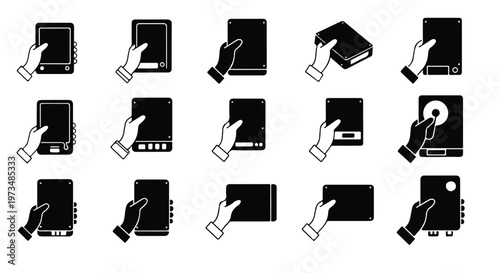 Hand holding various computer hardware.