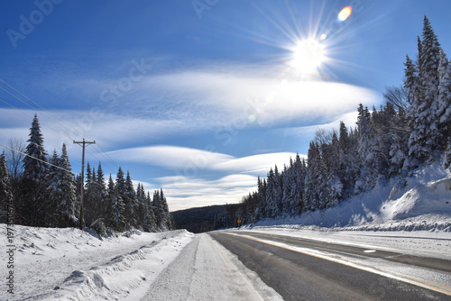 A deserted road in winter, Québec, Canada