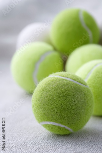 closeup of tennis balls, textured background