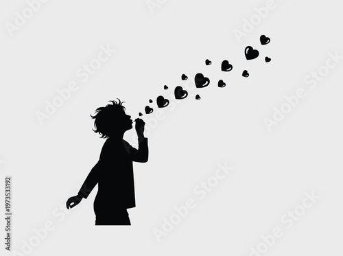 A black silhouette of a happy child blowing a stream of heart shaped bubbles into the air today