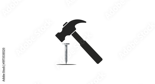 Hammer driving a metal nail.