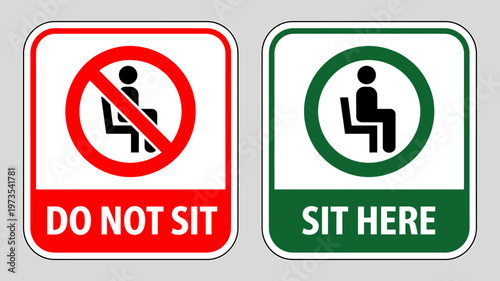 Red and green signs indicating sitting allowed or not allowed here