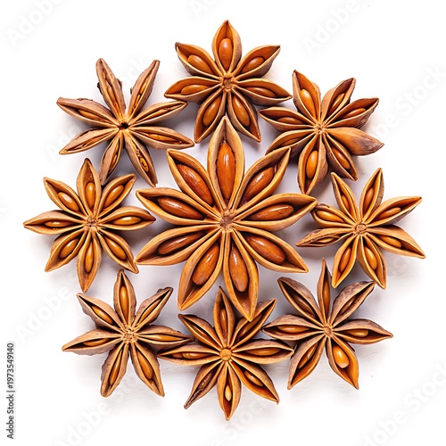 Star anise spice arranged symmetrically on white background showcasing brown star shaped pods with multiple points perfect for culinary herbal or aromatic themes