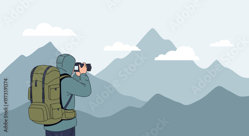 Hiker photographing majestic mountain landscape with backpack