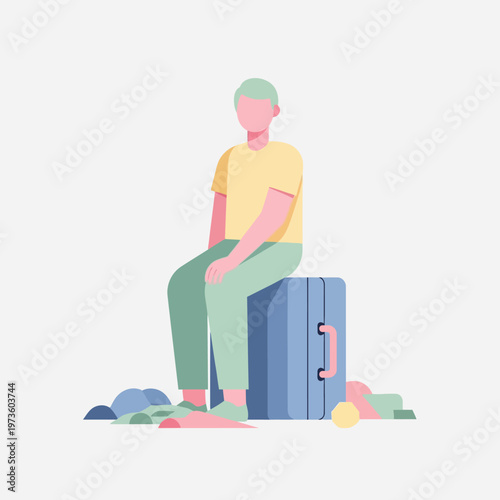 Man sitting on suitcase with clothes scattered around, ready for travel.