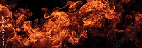 Vibrant Orange Flames Dance in Darkness, Intense Fire Abstract Background.