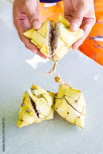 Freshly cooked Filipino puso rice, wrapped in coconut leaves. Puso, or hanging rice, is a traditional Filipino delicacy from Cebu and the Visayas region