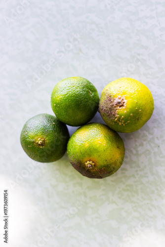 calamansi fruits, known as the Philippine lime, calamansi is an essential ingredient in Filipino cuisine